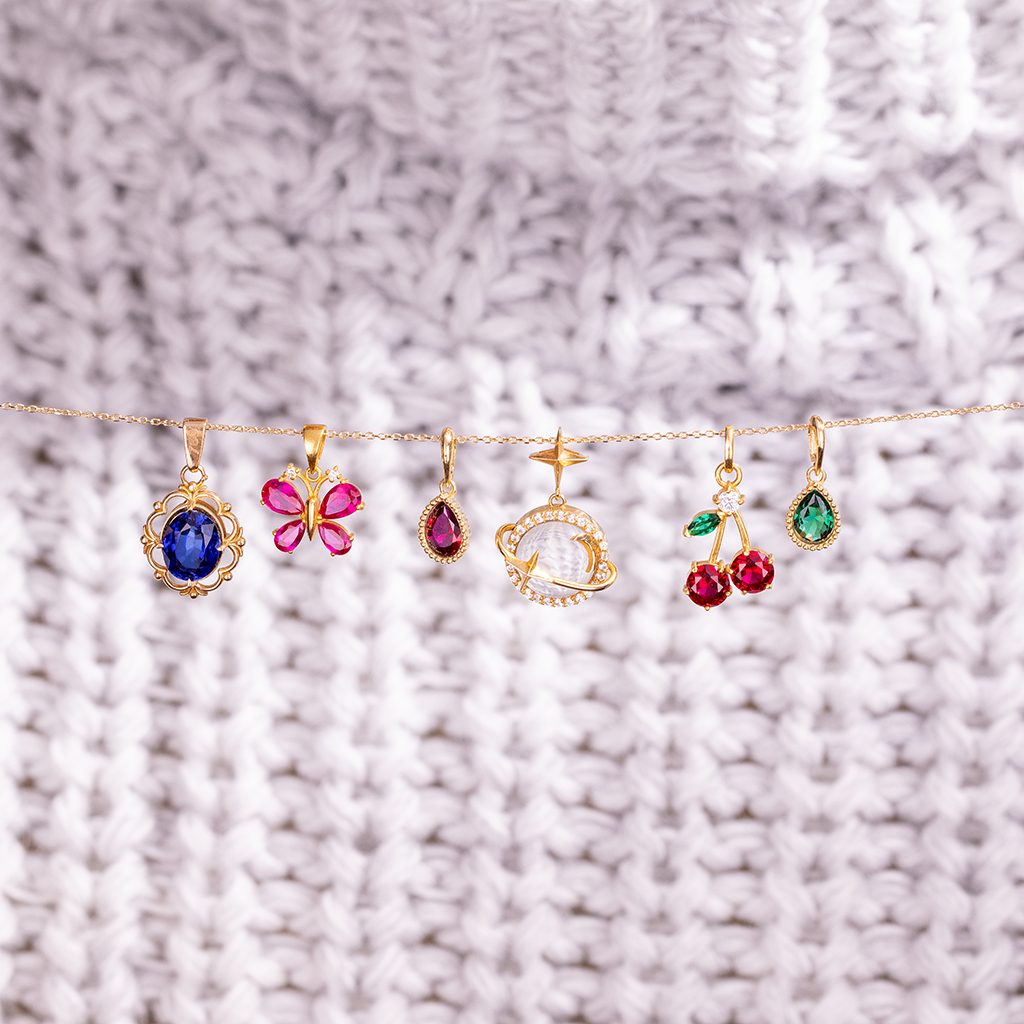 1X0A6514 آویز طلا با سنگ سبز مدل برگ