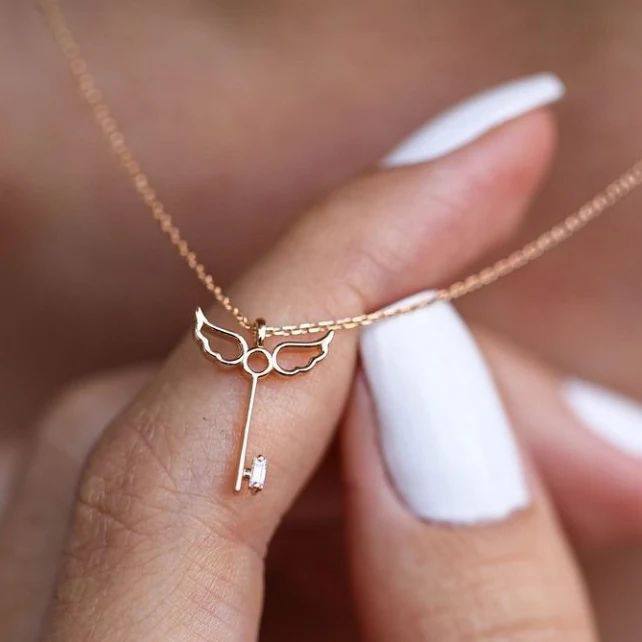 گردن آویز طلا کلید باغ بهشت