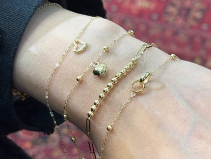 دستبند طلا با آویز قلب تو خالی