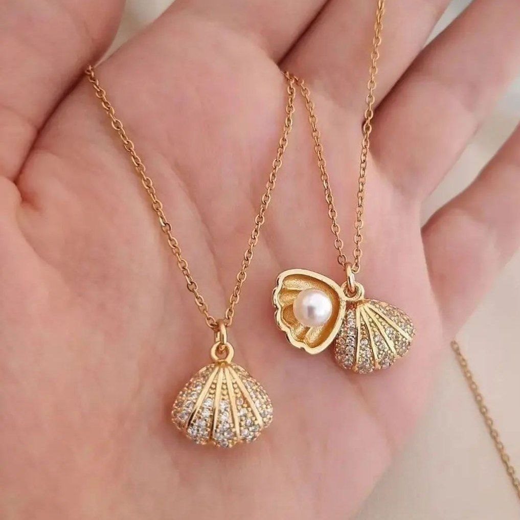 photo_2025-06-07_13-03-53.jpg گردنبند طلا مدل صدف