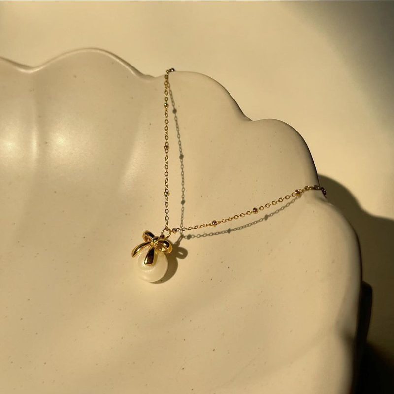 آویز طلا پاپیون مروارید